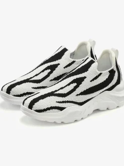 Baskets sneakers qui épousent parfaitement le pied grâce à la matière textile douce