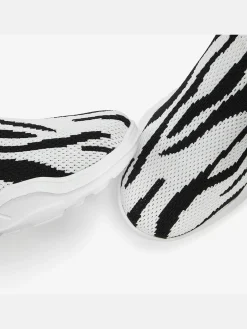 Baskets sneakers qui épousent parfaitement le pied grâce à la matière textile douce