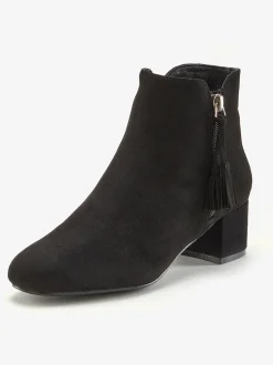 Bottines détails houppe tendance
