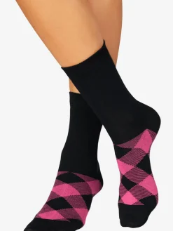 Chaussettes les motifs disparaissent dans la chaussure
