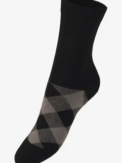 Chaussettes les motifs disparaissent dans la chaussure