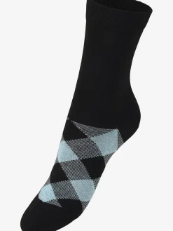 Chaussettes les motifs disparaissent dans la chaussure