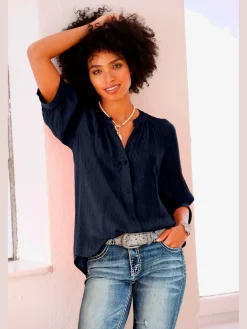 Chemisier à manches courtes look tendance avec ourlet arrondi