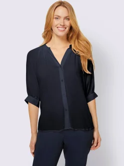 Chemisier à manches courtes look tendance avec ourlet arrondi