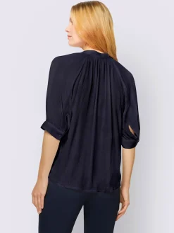 Chemisier à manches courtes look tendance avec ourlet arrondi