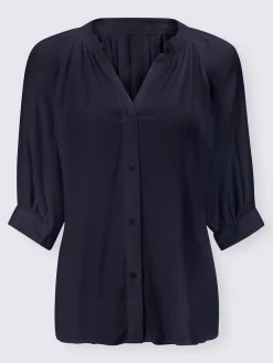 Chemisier à manches courtes look tendance avec ourlet arrondi