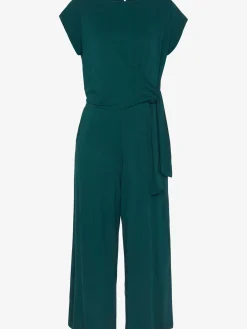 Combinaison pantalon large encolure ronde avec fermeture boutonnée au dos