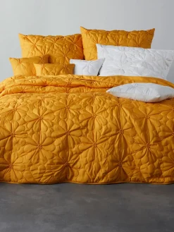 Couvre-lit aspect soyeux 100% polyester