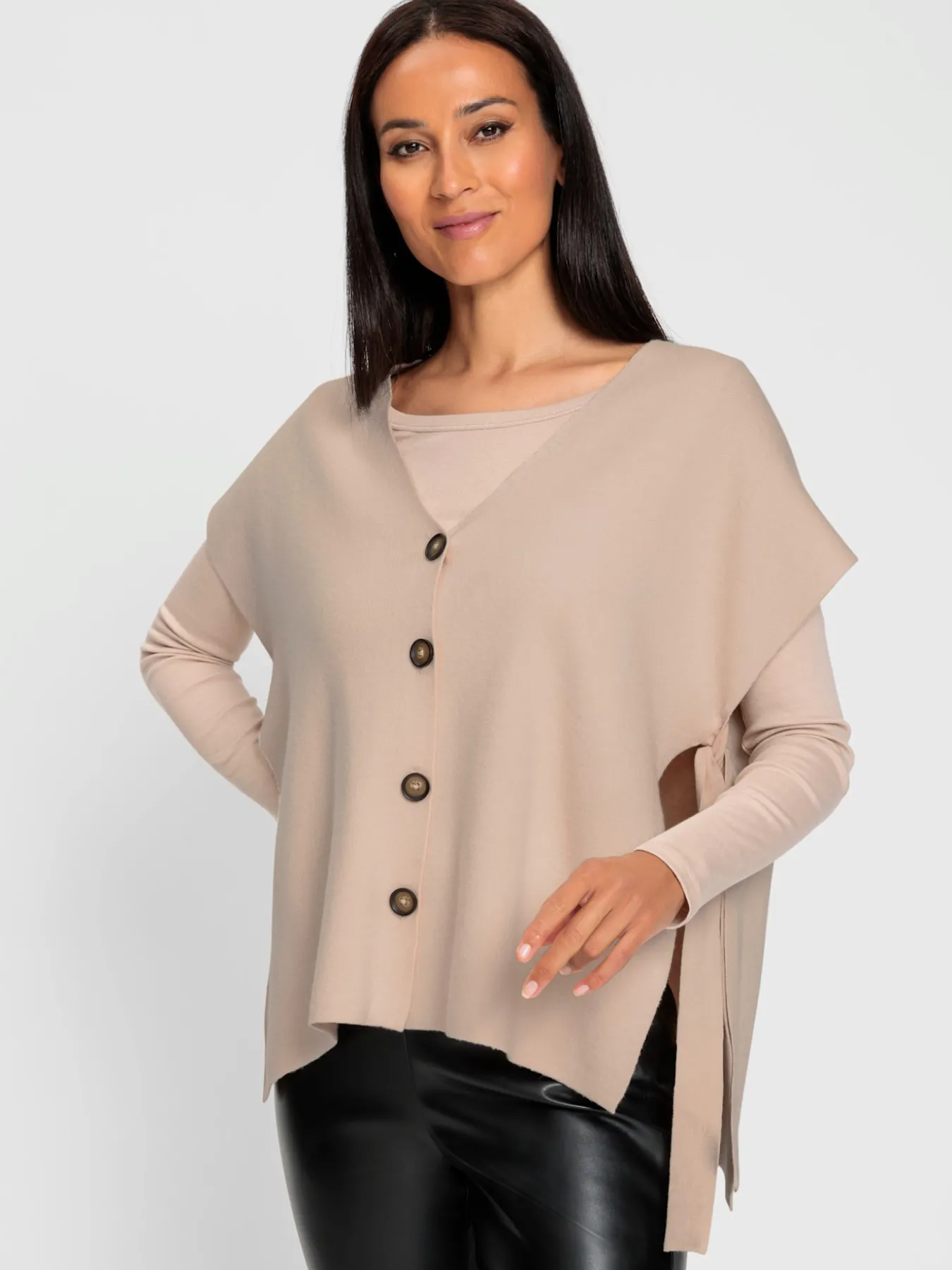 Gilet en tricot fentes latérales originales avec liens à nouer