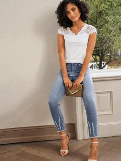 Jean 7/8 effet « destroy » tendance
