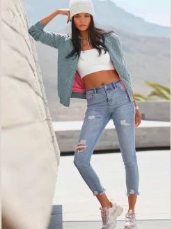 Jean effet déchiré jambes affinées