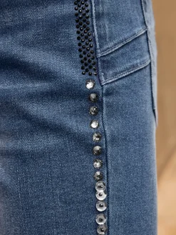 Jean push-up rivets décoratifs tendance le long des coutures latérales
