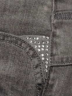 Jean skinny pierres brillantes sur les poches