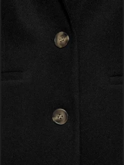Manteau avec grand col à revers