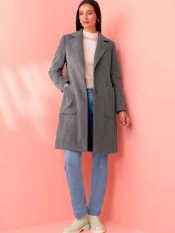 Manteau court poches plaquées spacieuses