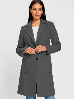 Manteau court poches plaquées spacieuses