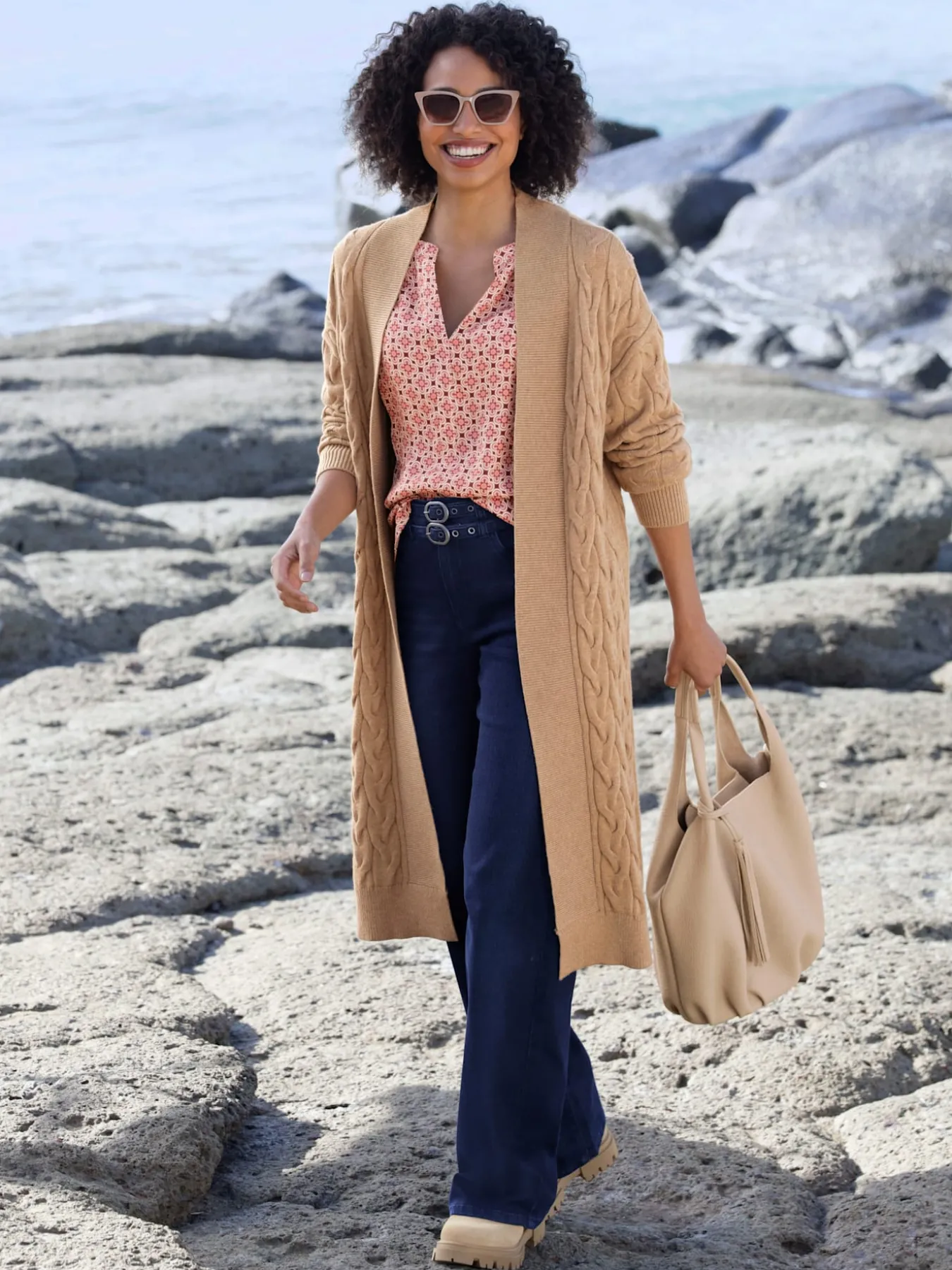 Manteau en tricot superbe motif torsadé