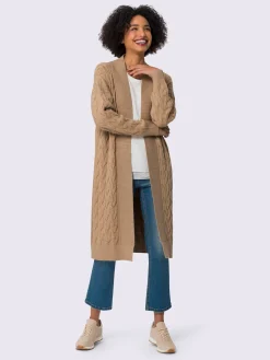 Manteau en tricot superbe motif torsadé