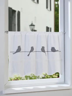 Panneau à tendre au niveau du cadre de la fenêtre