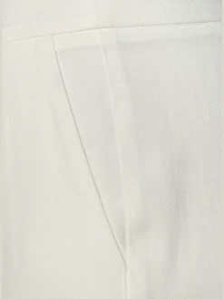 Pantalon 7/8 poches fendues pratiques