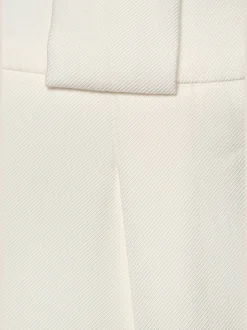 Pantalon 7/8 poches fendues pratiques