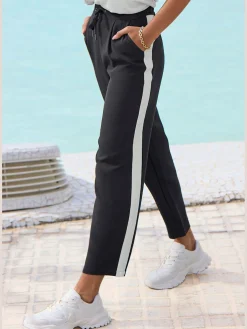Pantalon ceinture lisse devant. élastique au dos