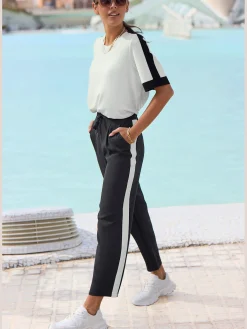 Pantalon ceinture lisse devant. élastique au dos