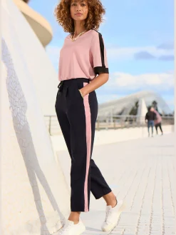 Pantalon ceinture lisse devant. élastique au dos
