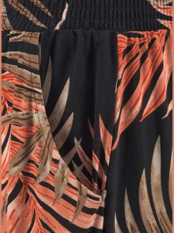 Pantalon de plage avec imprimé palmiers