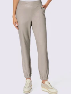 Pantalon en synthétique boutons fantaisie dorés
