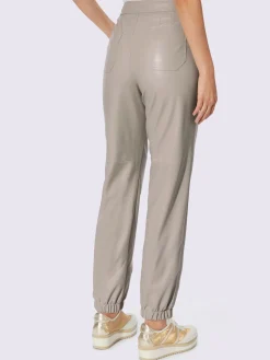Pantalon en synthétique boutons fantaisie dorés