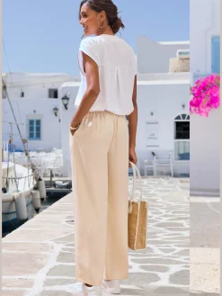 Pantalon poches fendues pratiques