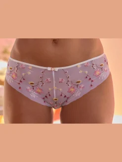 Panty fantaisie avec joli nœud décoratif et accessoire au centre devant