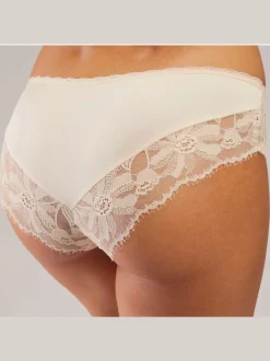 Panty féminin avec petit nœud décoratif au centre devant