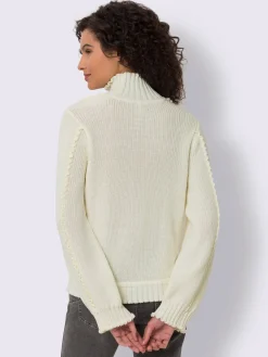 Pull à col montant finitions ondulées flatteuses