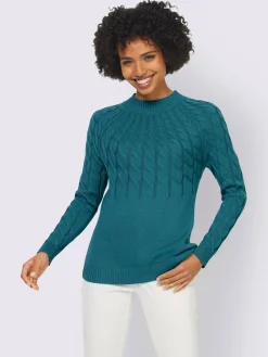 Pull à col montant motif torsadé affinant
