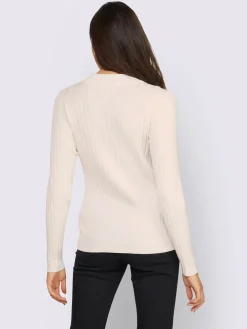 Pull à col montant tricot côtelé moderne
