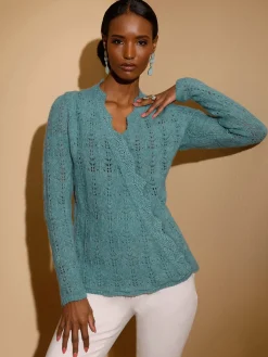 Pull ajouré bord ondulé élégant