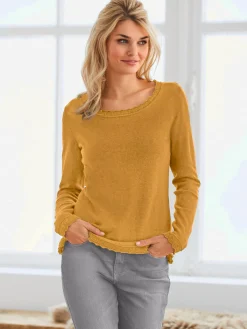 Pull ajouré jolie bordure ajourée à l'encolure, à la finition des manches et à l'ourlet