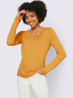 Pull ajouré jolie bordure ajourée à l'encolure, à la finition des manches et à l'ourlet