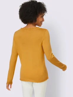 Pull ajouré jolie bordure ajourée à l'encolure, à la finition des manches et à l'ourlet