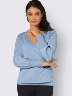 Pull cache-cœur conception soignée