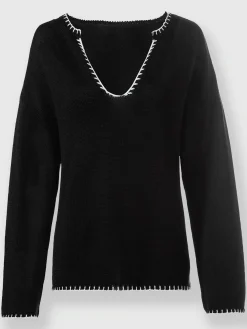 Pull détails contrastés