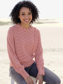 Pull en tricot fin bordure ajourée qui attire le regard
