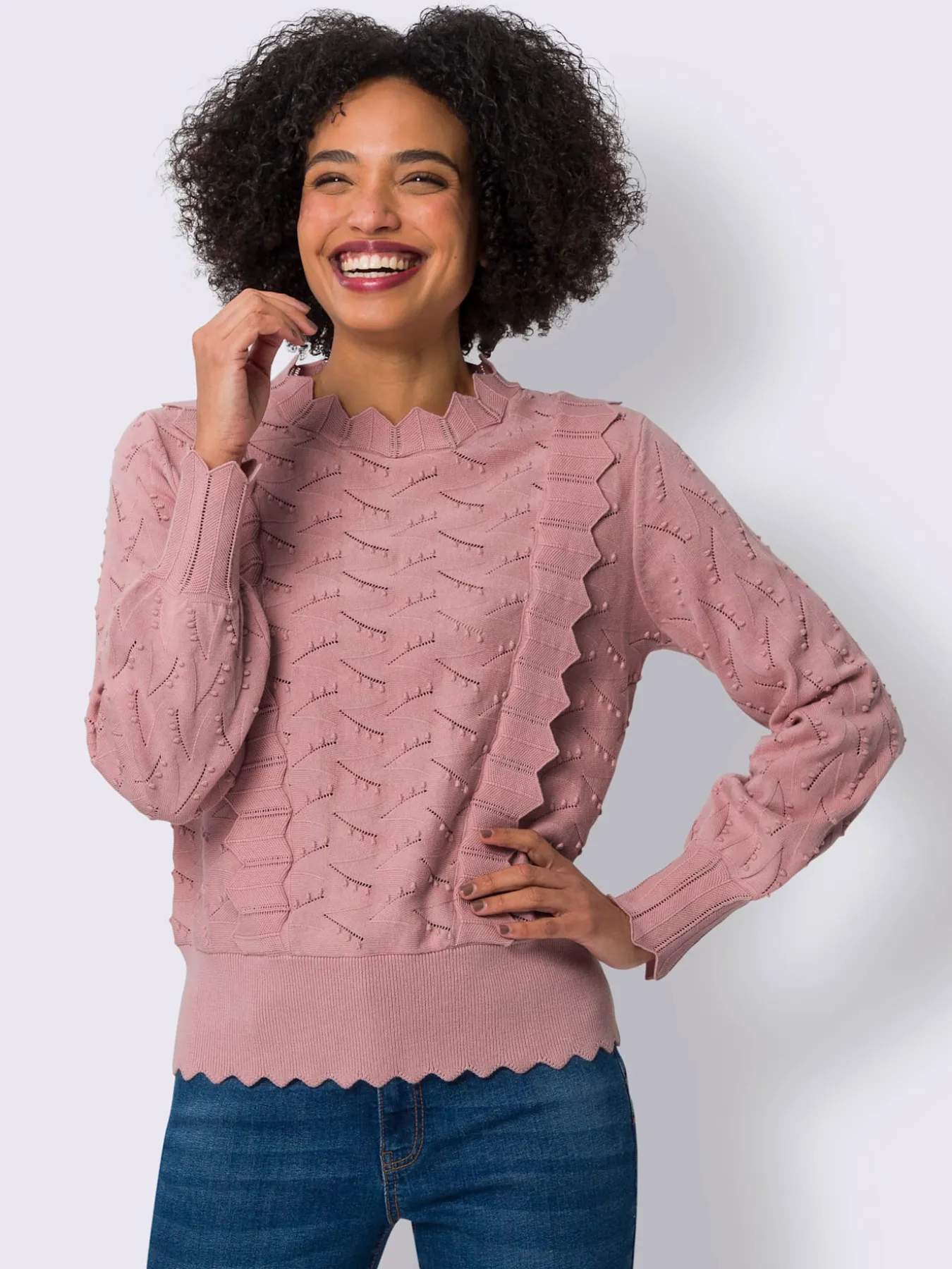 Pull en tricot fin bordure ajourée qui attire le regard
