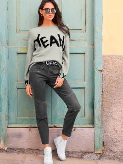 Pull en tricot inscription tendance