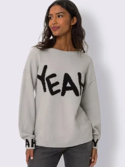 Pull en tricot inscription tendance