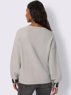 Pull en tricot inscription tendance