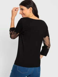 Pull encolure ronde empiècements brodés transparents