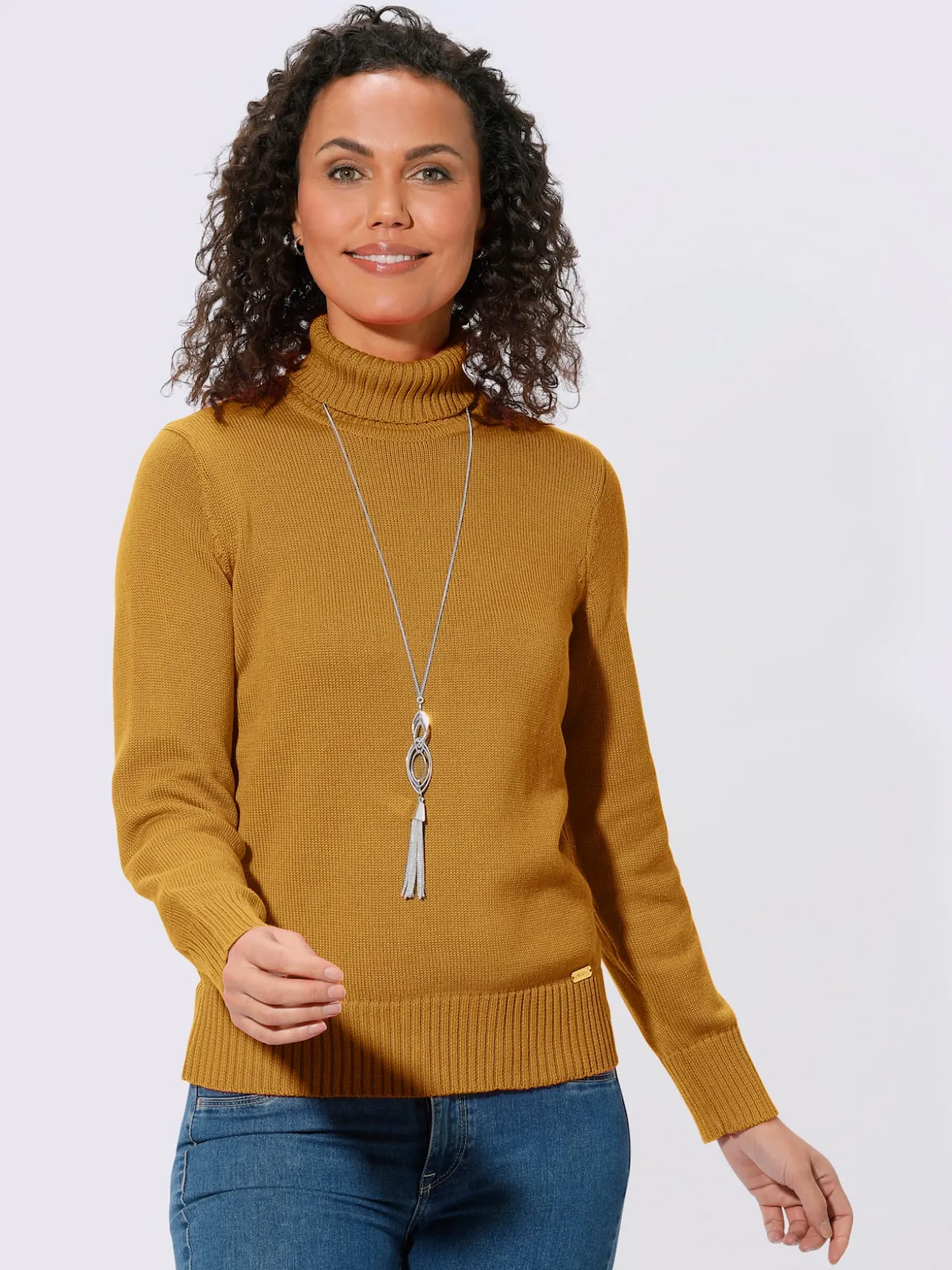 Pull femme col roulé manches ourlet avec finitions côtelées